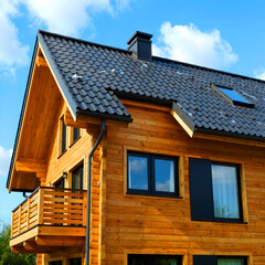 The modern wooden home's facade.