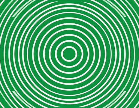 A concentric pattern of white rings on a green background, radiating outward