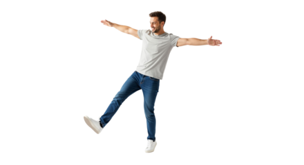 Joyful man balancing with open arms, happiness and casual style on white backdrop