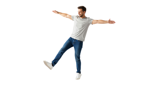 Joyful man balancing with open arms, happiness and casual style on white backdrop