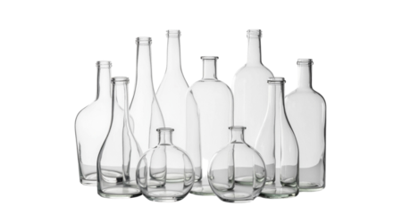 Assortment of elegant empty glass bottles on a clean white backdrop