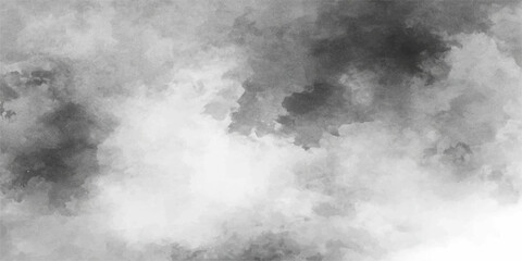 Dark smoke drifts against the black and white abstract background like a stormy cloudscape