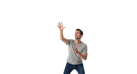 Man reaching upwards, looking up with curious expression on white canvas