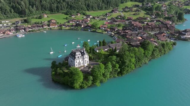 The beautiful Interlaken valley and Thunersee lake, Beatiful river at Switzerland in sunny day during summer, Aereal drone view of stunning idyllic nature scenery of lake Brienz with turquoise waters