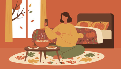Autumn comfort Woman uses smartphone while enjoying warm soup and cookies indoors