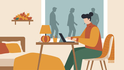 Cozy autumn remote office setup Woman works on laptop at home desk with fall decorations