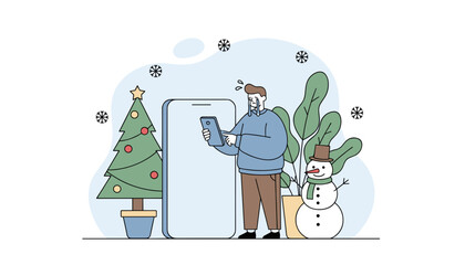Stressed man crying while using a tablet during the Christmas holiday highlighting loneliness and seasonal depression