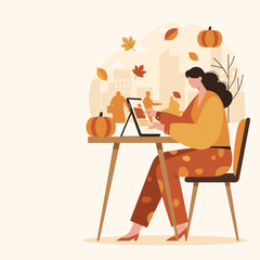 Woman uses tablet for work during autumn season in the city surrounded by pumpkins and fall leaves