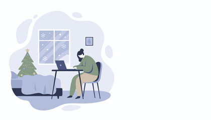 Remote worker typing on laptop in a cozy bedroom with Christmas tree during winter snowfall