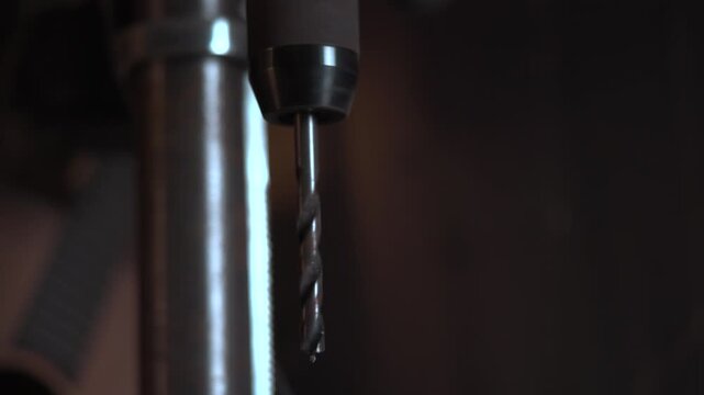 Close up of a spinning drill press bit. Media
