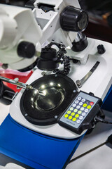 diamond polishing factory, gemological microscopes in lab diamond factory to precisely inspect diamonds for quality control, grading, and polishing