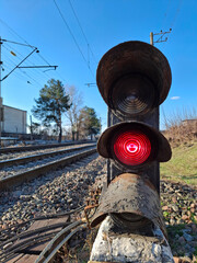 Railway traffic light with red signal. Railroad traffic light - signaling device
