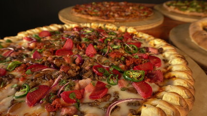 Delicious pizza with cold cuts and chili peppers