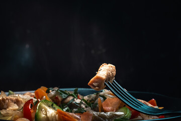 stir-fried dish of chicken, pumpkin, pepper, onion, parsley, garlic, carrot and various vegetables