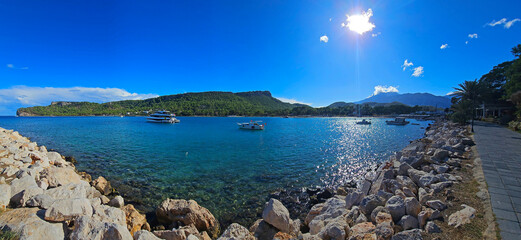 Panoramic view of bay with yachts and boats .