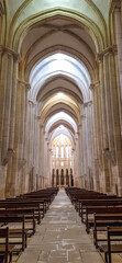 Obraz premium Interior of Alcobaca monastery, Mosteiro de Santa Maria de Alcobaca in Portugal. A Medieval Roman Catholic Monastery
