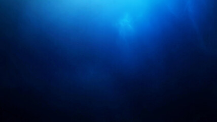 Obraz premium Deep blue abstract background with soft light effects and mysterious atmosphere
