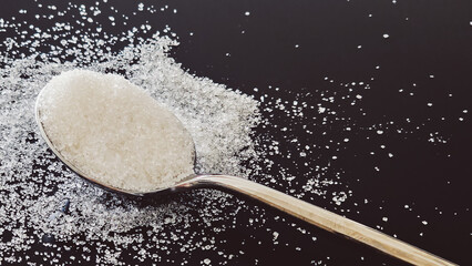 Sugar Spoon on Black Background