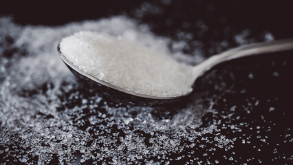 Sugar Spoon on Black Background