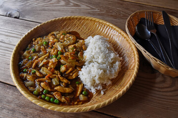Chinese rice with chicken in soy sauce