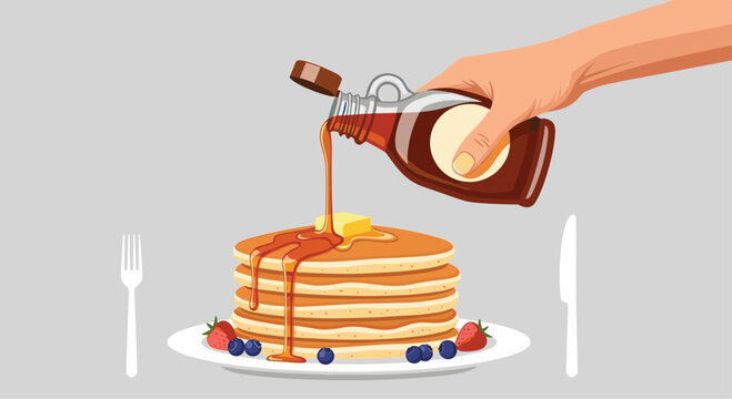 Delicious stack of fluffy pancakes being drizzled with sweet maple syrup, topped with butter and fresh berries