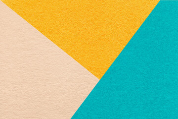 Fototapeta premium Geometric beige, yellow and turquoise texture paper background for presentation, banner or card design template