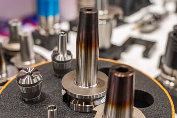 Large lathe chuck. Lathe with large chuck. Part clamping systems in CNC machines. Vice for clamping parts. Holder for clamping round parts