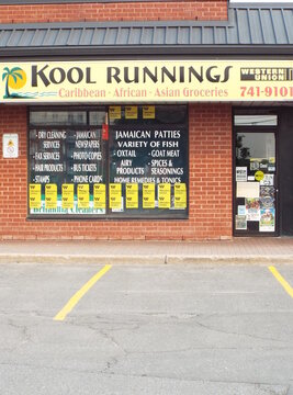 Gloucester, ON, Canada-May 23,2025:The storefront of "Kool Runnings", a grocery store specializing in Caribbean, African, and Asian products at 2200 Montr&eacute;al Rd.
