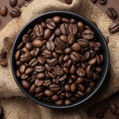 Fototapeta premium a bowl of coffee beans on the table, top view, dark brown background with burlap cloth, coffee beans scattered around the scene, product photography, high resolution, professional photograph, 