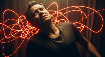 A man is depicted looking scared, with swirling, red light trails surrounding him