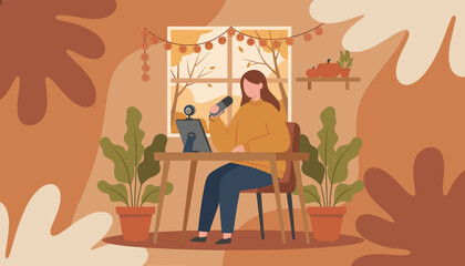 Woman hosting a podcast or video stream from her cozy autumn home studio Remote work concept