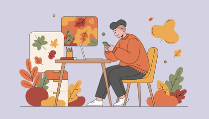 Young man texting on his phone while working remotely in a stylized autumnal home office
