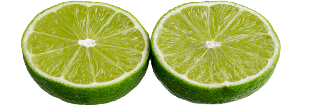 Freshly cut lime halves showcasing vibrant green interiors, placed on a clean surface, with a soft light illuminating their texture, ideal for culinary and beverage use