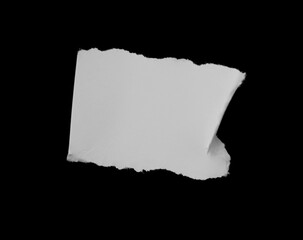 ripped paper on black background.