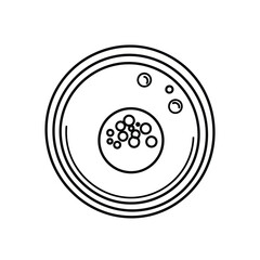 Petri dish containing cell culture being observed in laboratory setting, representing scientific research and experimentation in a sterile environment.