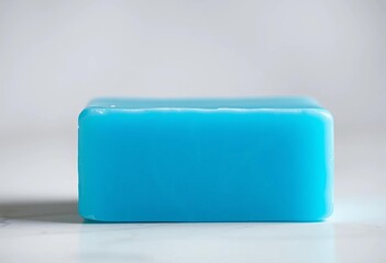 Close-up of a single blue bar of soap, clean and pristine,   closeup, blue soap