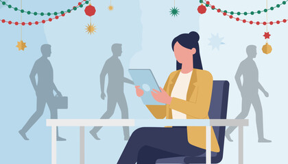 Businesswoman using tablet at desk during the festive office holiday season