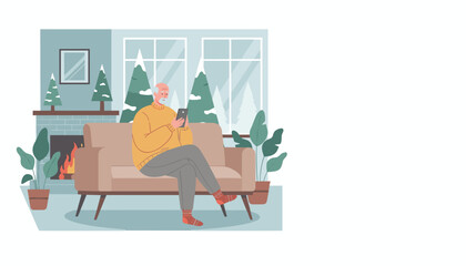 Cozy winter relaxation Senior man uses a smartphone by the fireplace in a warm living room