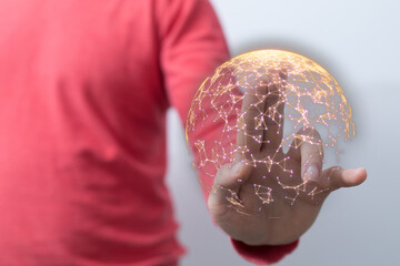 Abstract image of hand holding network globe, concept of global connectivity, technology, and...