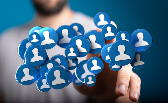 Concept image of a hand interacting with a collection of user profile icons, representing online communities and social connections.