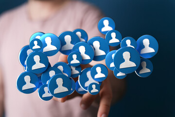 Hand reaching out to a group of people icons. Concept of social networking, community, communication, and connectivity. Digital age of people, c