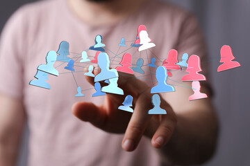 Digitally rendered social network abstract showing interconnected people, global communication, and...