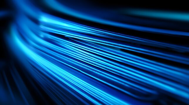 Brilliant blue light streaks flow dynamically across a dark, abstract background