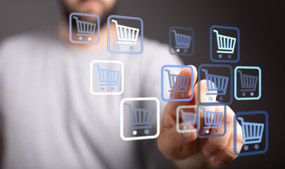 Person interacting with virtual shopping cart icons representing online retail, e-commerce, and...