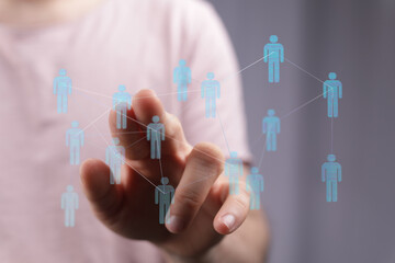 Concept of teamwork and communication through human connection with digital interface. Hand...