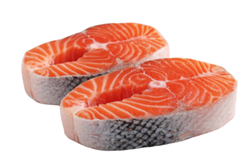 Two fresh salmon steaks with white flesh and orange meat on black fish food, Isolated On Transparent Background, Png Cut Out
