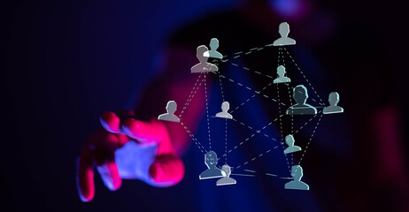 Abstract network of people icons interconnected, with a hand reaching out, symbolizing connection and networking in the digital world. Ideal for