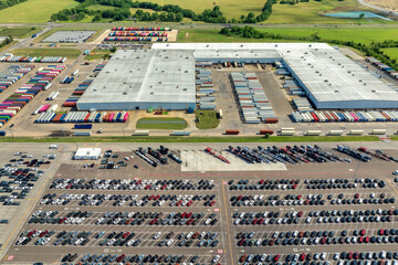 Cars parked ready for sale on automotive factory parking lot