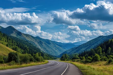 Fototapeta premium Scenic Valley Road with Lush Green Mountains and Blue Sky with Fluffy Clouds