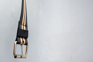 Belt accessory with metal adjuster